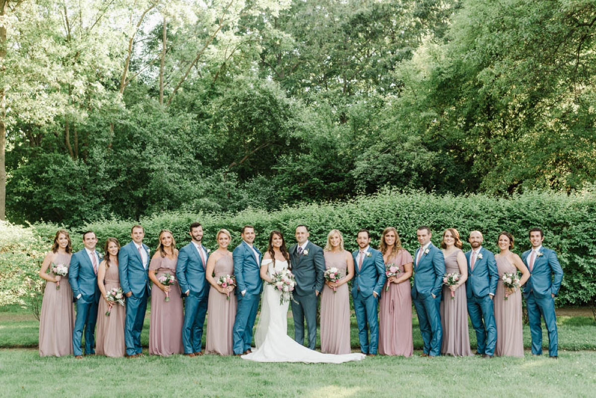 Garden Inspired Summer Wedding at Glen Magna Farms in Danvers, Massachusetts by Boston Wedding Photographer Annmarie Swift - Bridesmaids dressed in dusty rose dresses & groomsmen in  blue suits