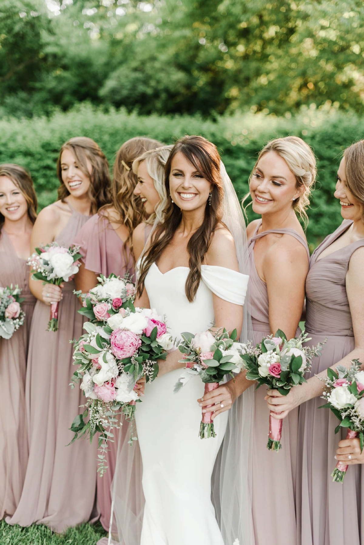 Garden Inspired Summer Wedding at Glen Magna Farms in Danvers, Massachusetts by Boston Wedding Photographer Annmarie Swift - Bridesmaids dressed in dusty rose dresses with bouquets